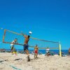 Partita di beach volley sulla sabbia.